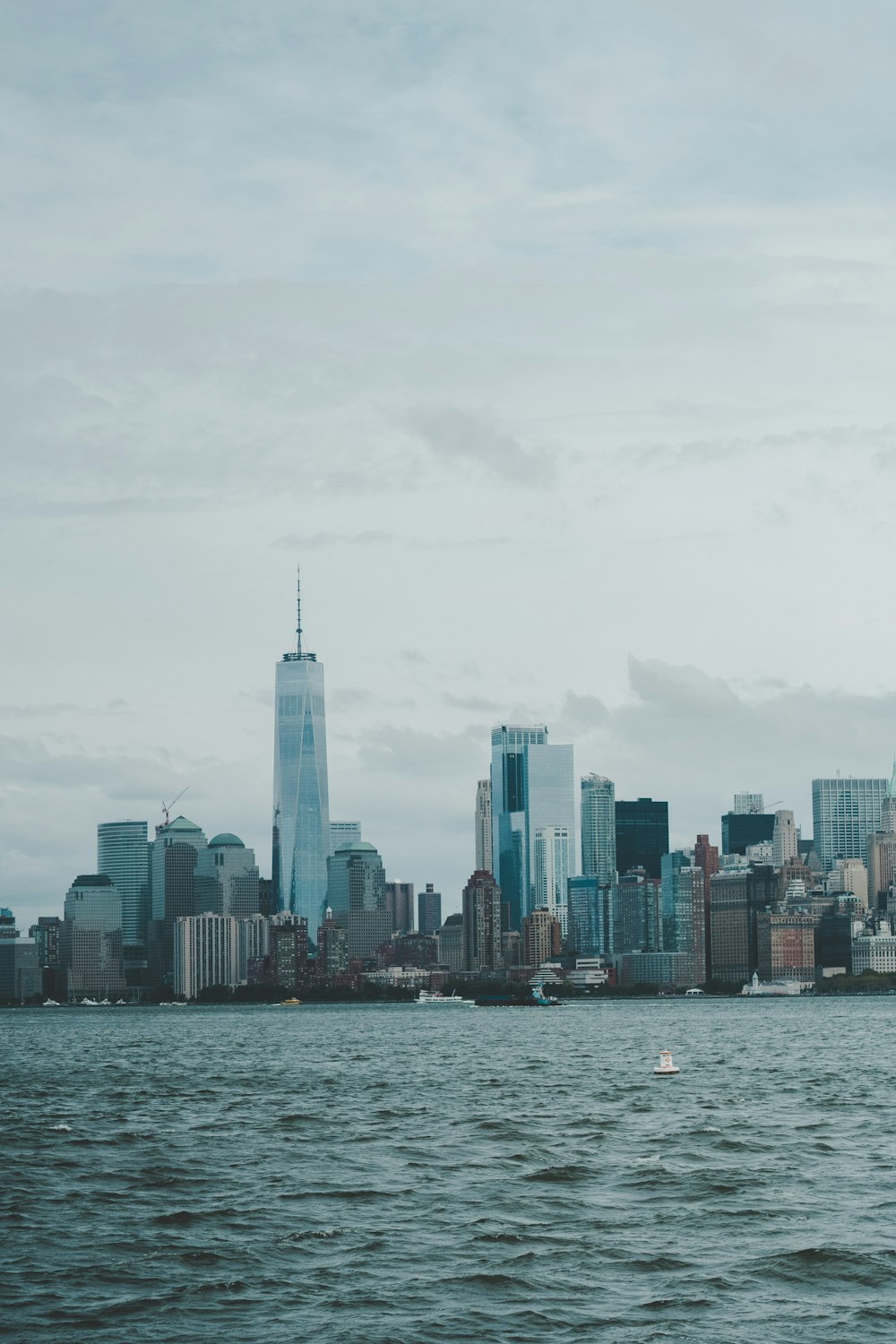 city buildings near body of water