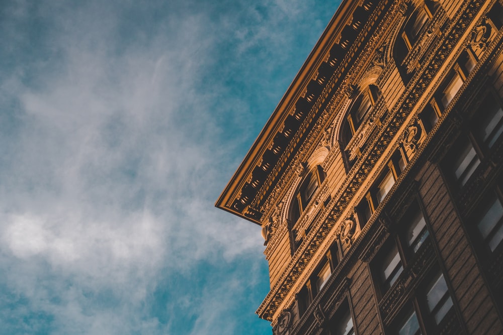 worm's-eye view of brown building