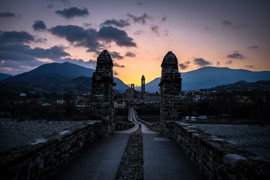 landscape photography of towers in Bobbio Italy