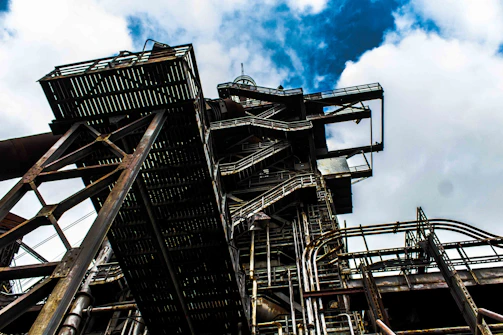 A panoramic view of a completed industrial facility with metal frameworks.