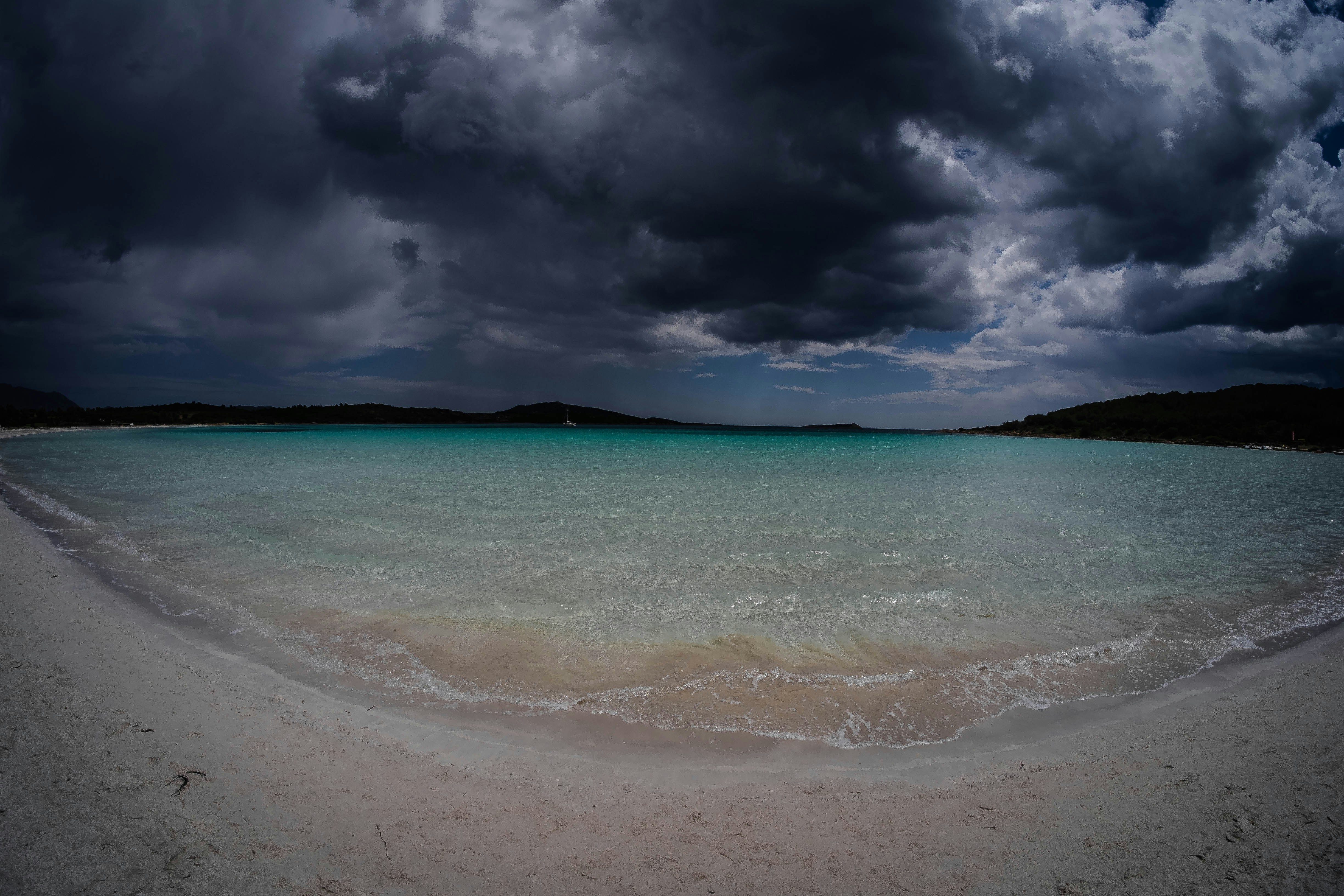 sea wave splashing on white sand seashore, The Eye Of The Storm