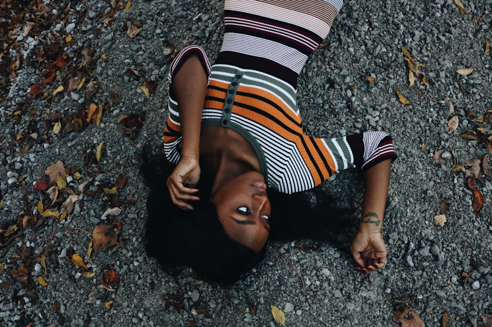 woman lying on sand