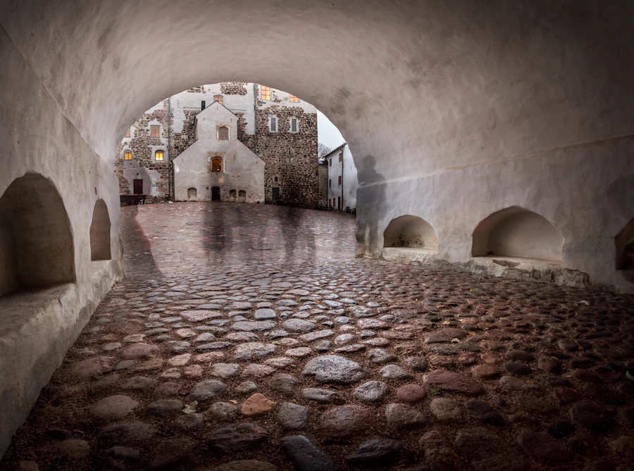 Stone courtyard and arch inside Turku Castle