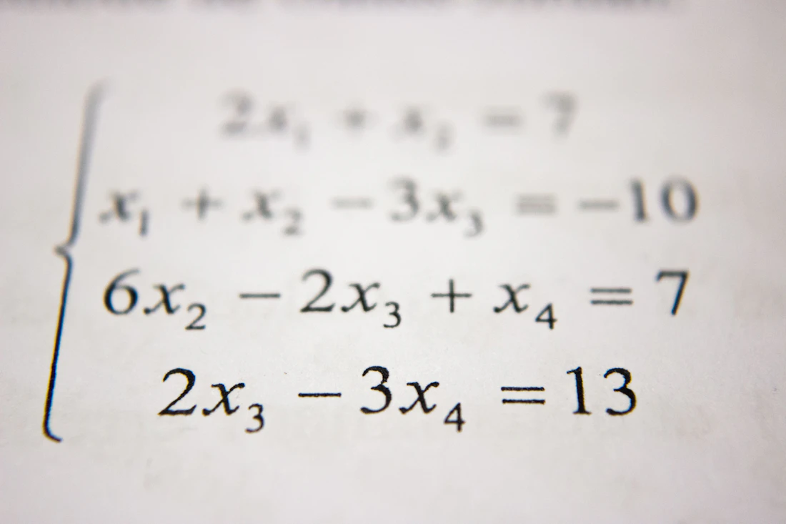 Mathematical diagrams on a chalkboard