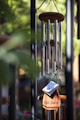 selective focus photography of gray and brown wind chime