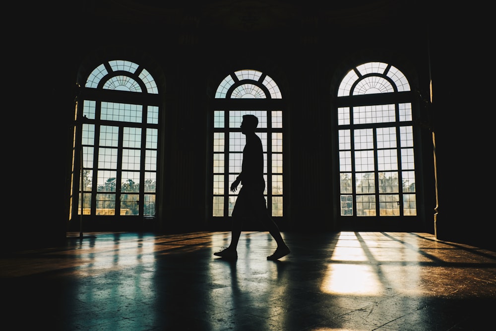 silhouette of person inside building