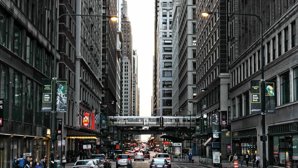 busy road in between buildings