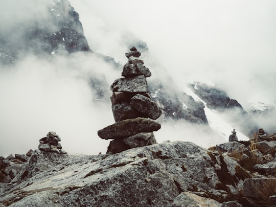 mountain covered in white fog in Salcantay Peru