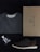 A cozy home setting with a neatly arranged clothing package.