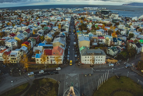 bird's eye view photo of concrete house in Hallgrimskirkja Iceland