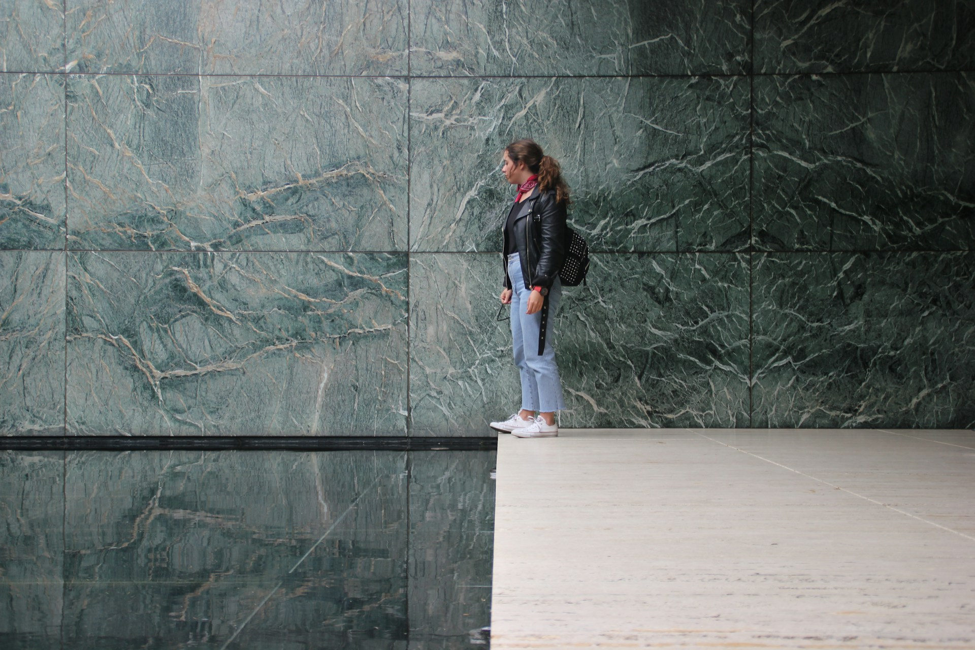 black and brown leather padded tub sofa