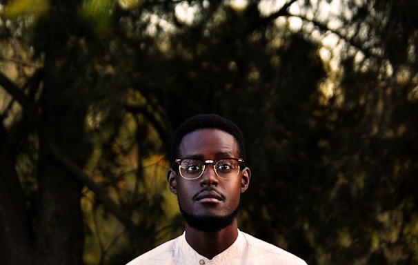 man wearing white button-up shirt