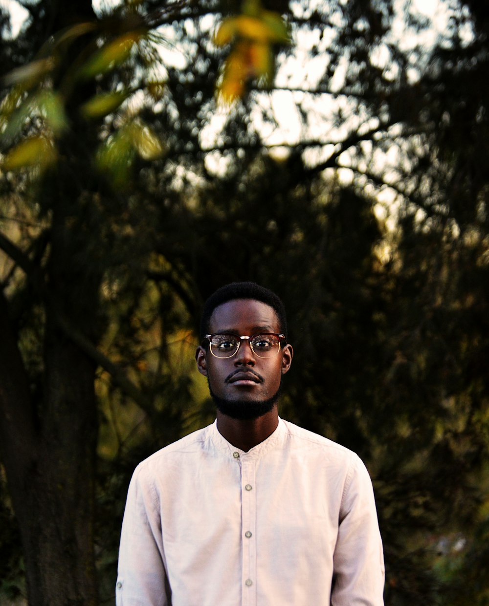 man wearing white button-up shirt