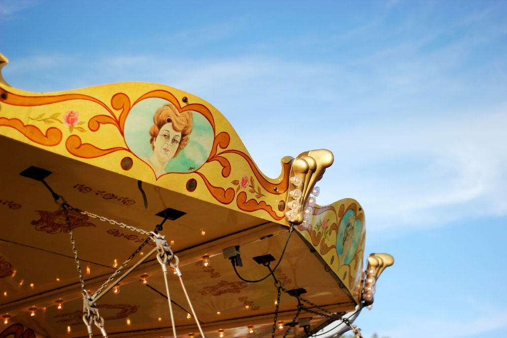 carousel under cloudy sky