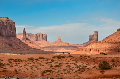 landscape photography of rock formation desert google meet background