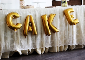 gold cake mylar balloons