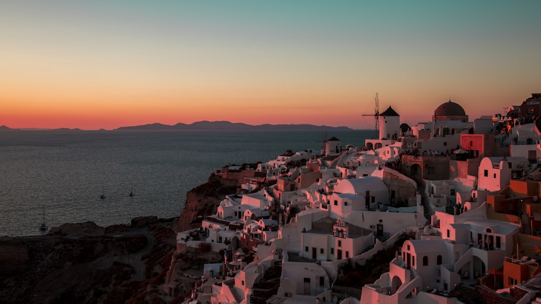 aerial view of assorted-color houses, Sunset in Santorini