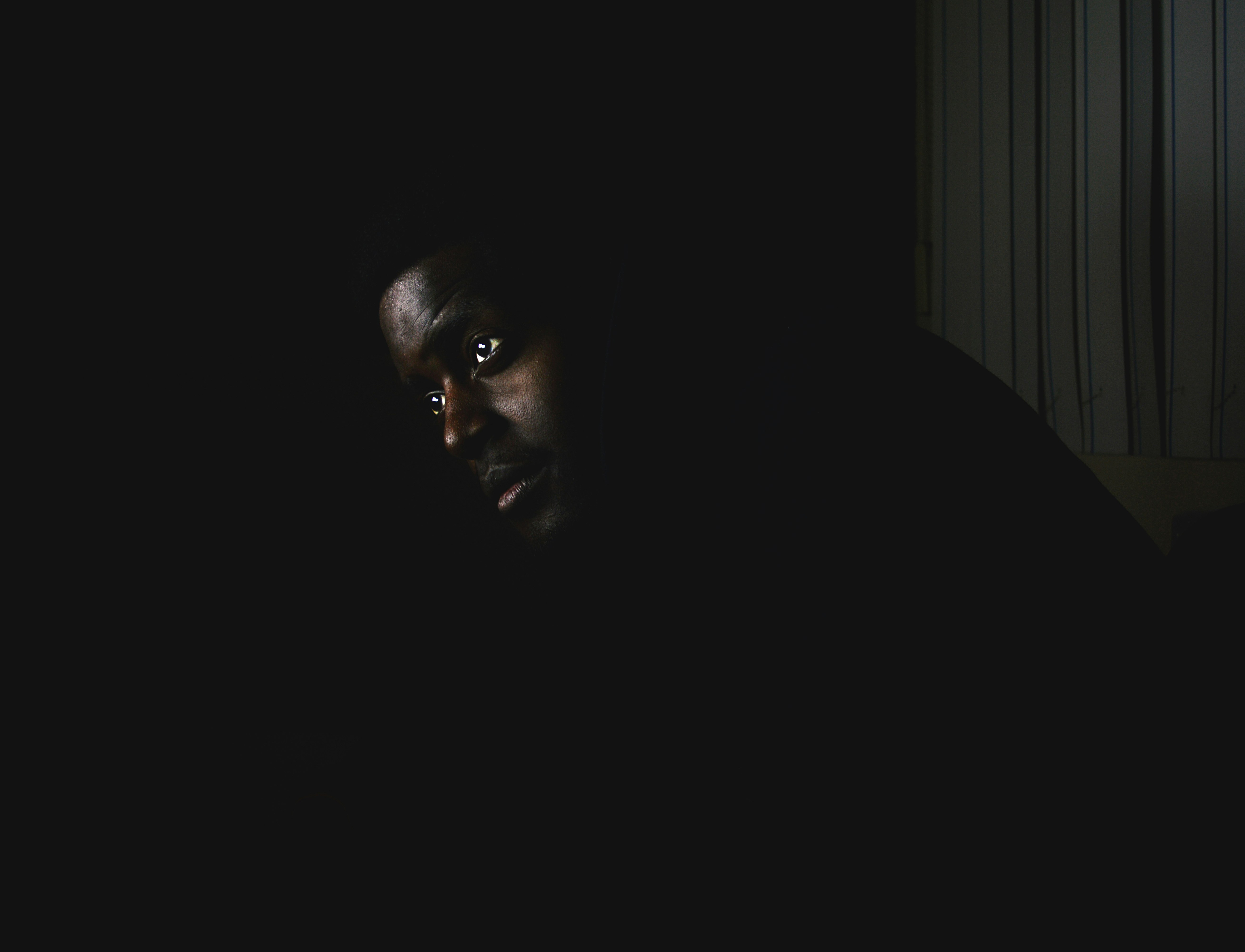 man in darkness