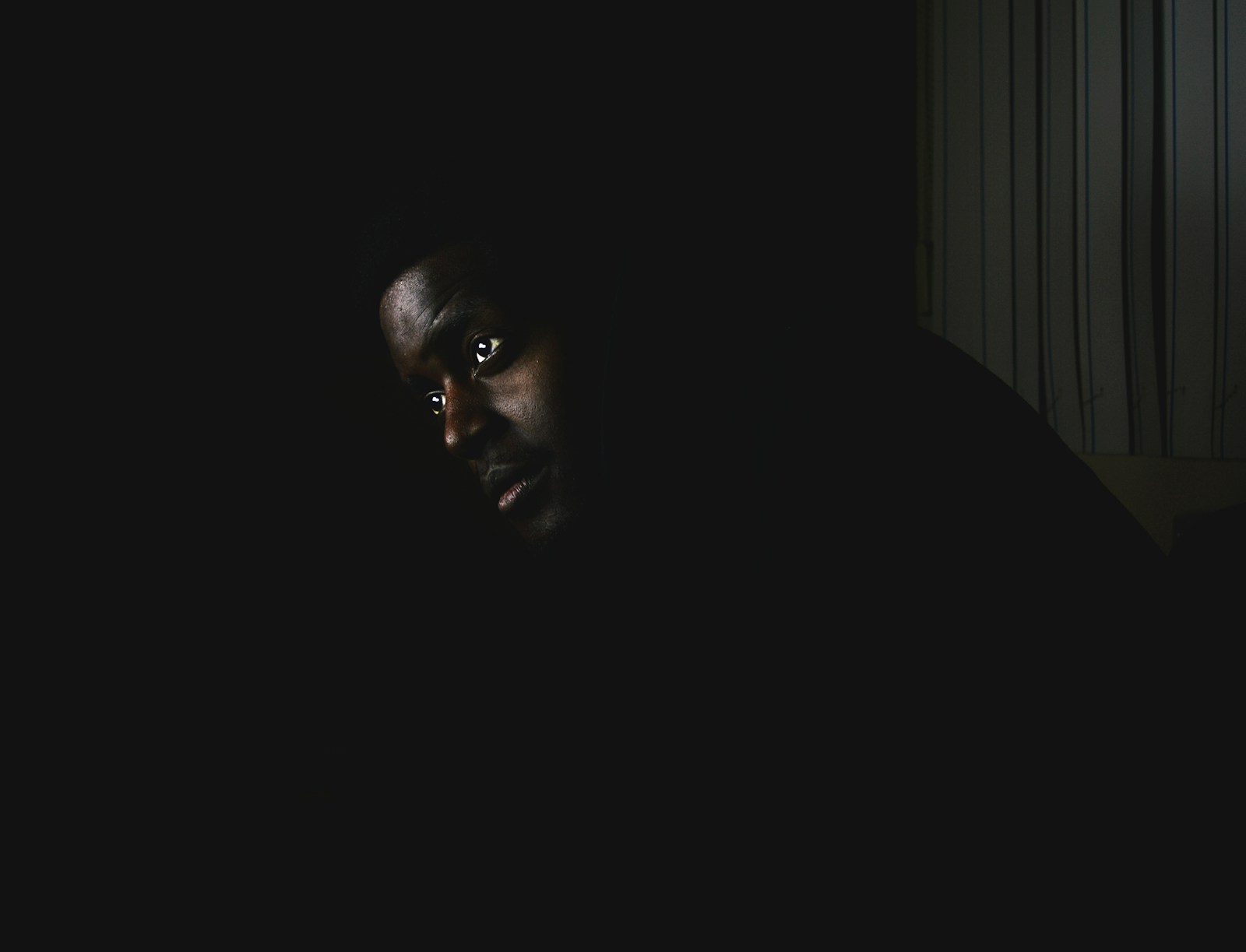 A man alone in the dark