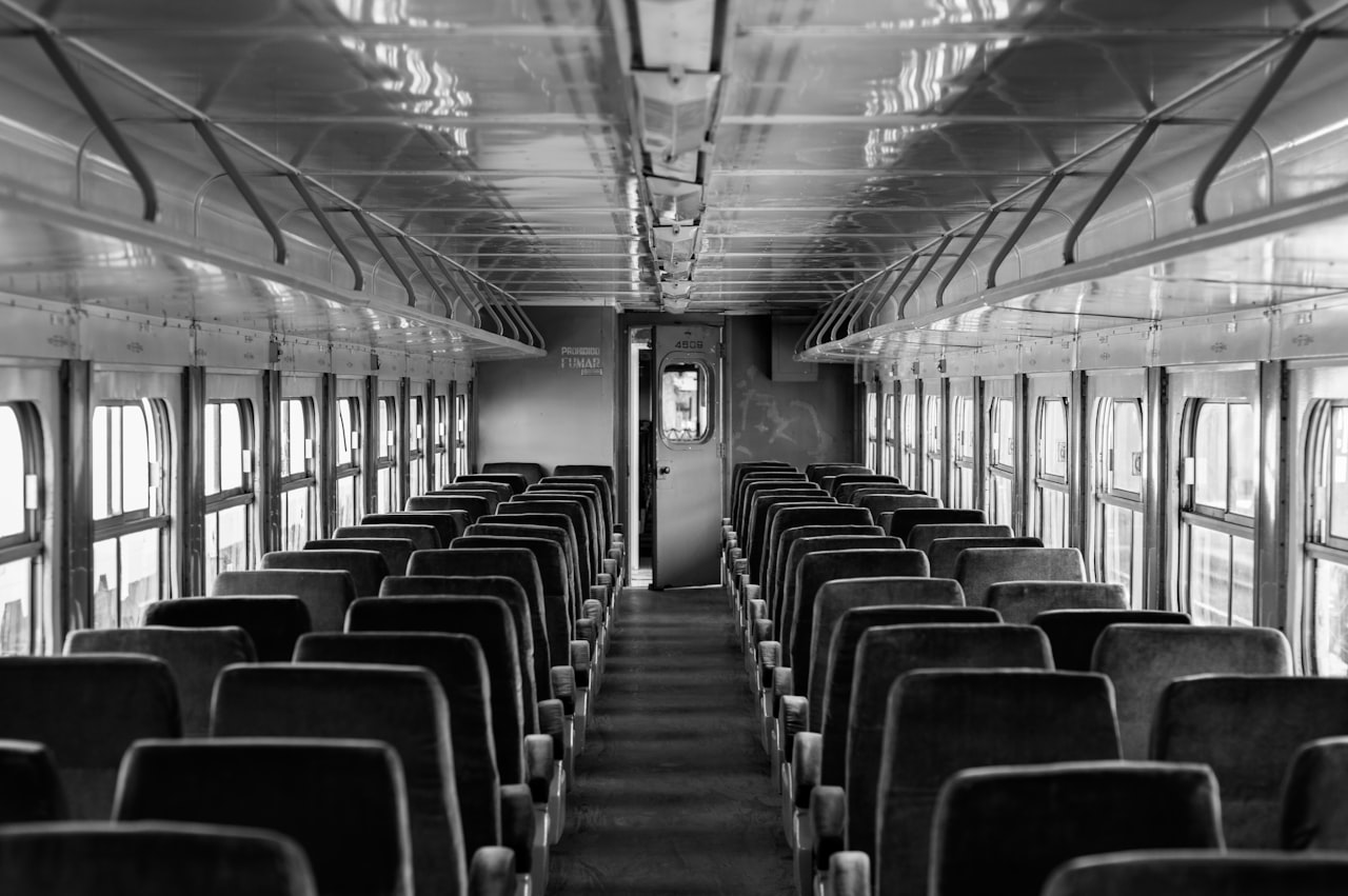 interior of train with red chairs