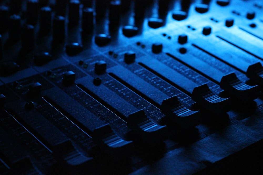 shallow focus photography of audio mixer