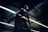Batman standing under steel roof