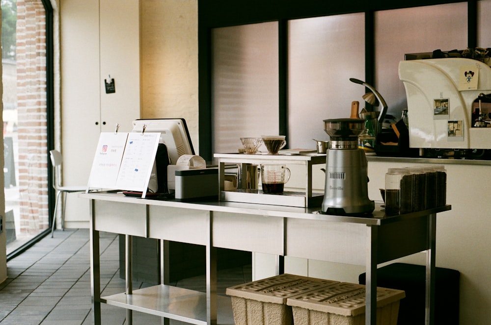 stainless steel table with coffeemaker