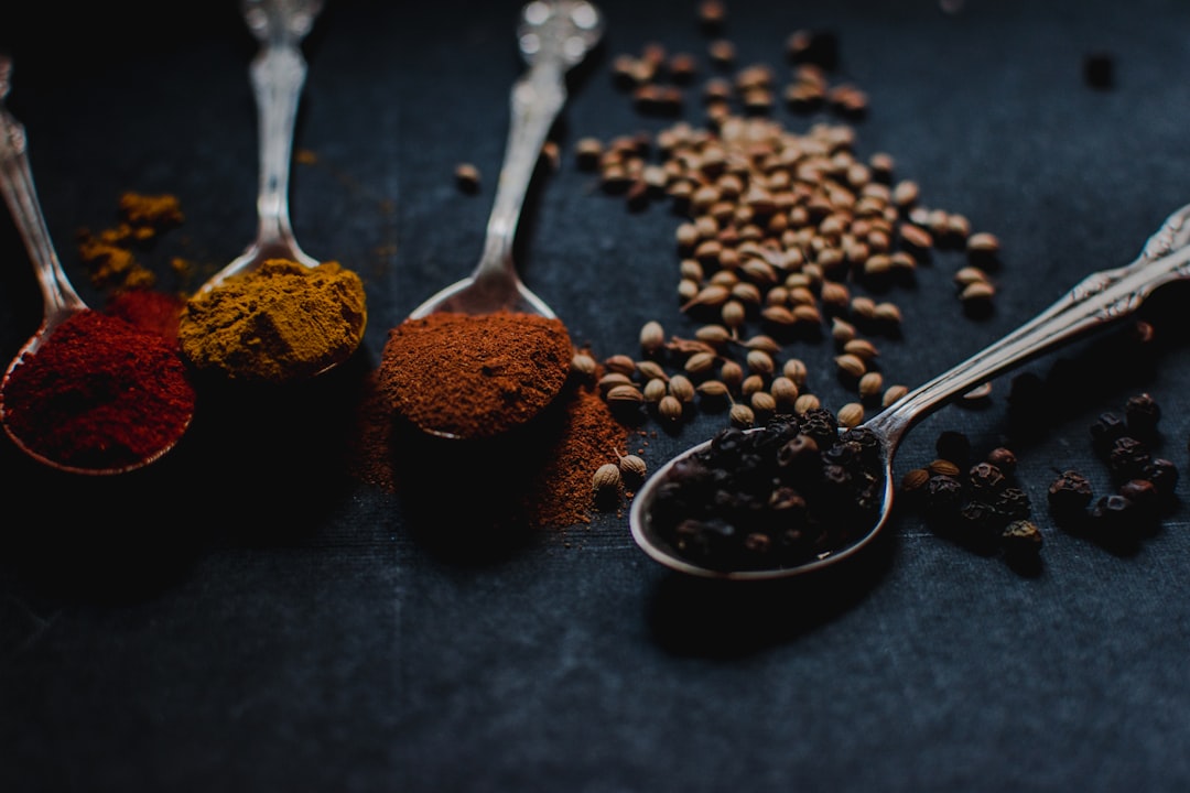 various spices in spoons