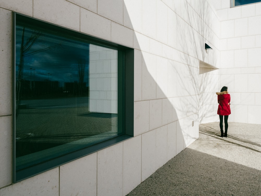 woman standing in front of wall