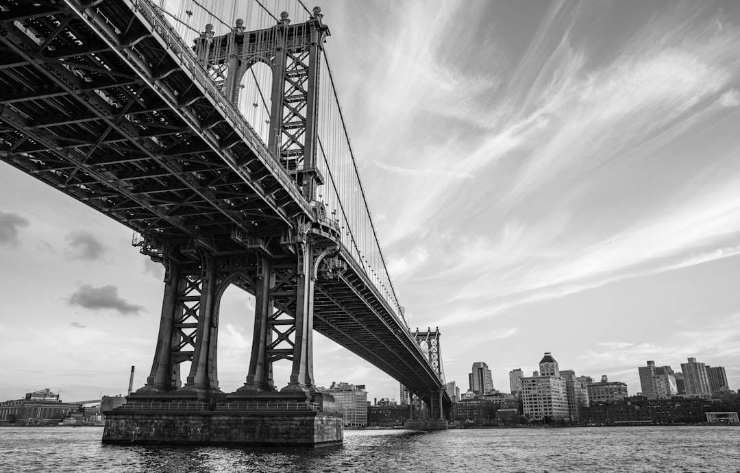 grayscale photo of Brooklyn Bridge New York