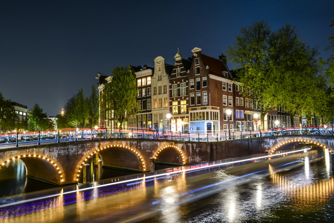 lighted city near on bridge, Beautiful night in Amsterdam