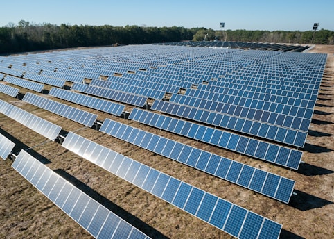 solar panel boards on brown ground