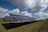 solar panels on green field