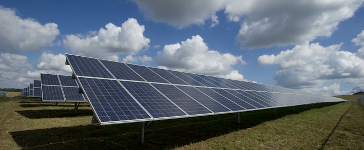 solar panels on green field