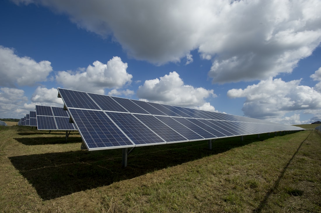 Solar panel field under clear sky