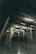 Wide shot of a luxury commercial space featuring a polished epoxy floor with a modern minimalist design.