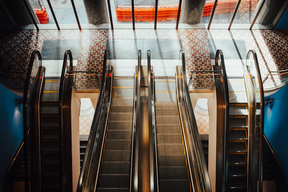 four gray escalators