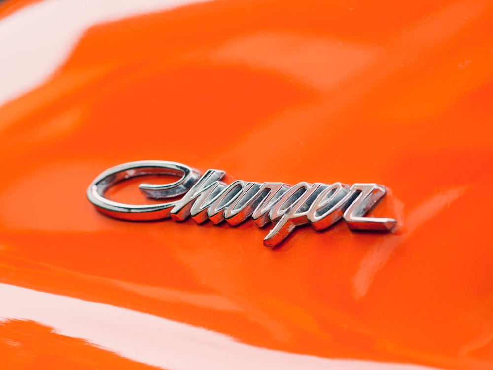 orange Dodge Charger close-up photography
