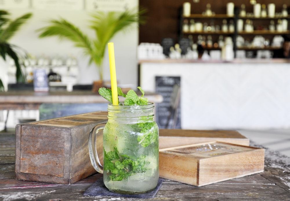 photo of beverage with yellow straw