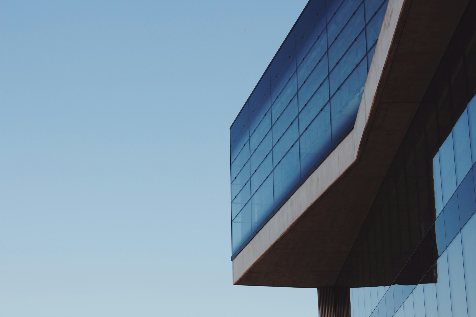 black and brown leather padded tub sofa