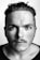 grayscale photography of man in scoop-neck top