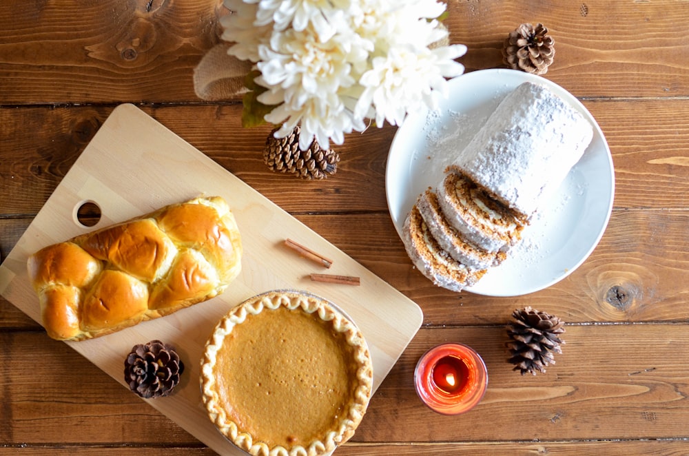 cake pie beside pine cones