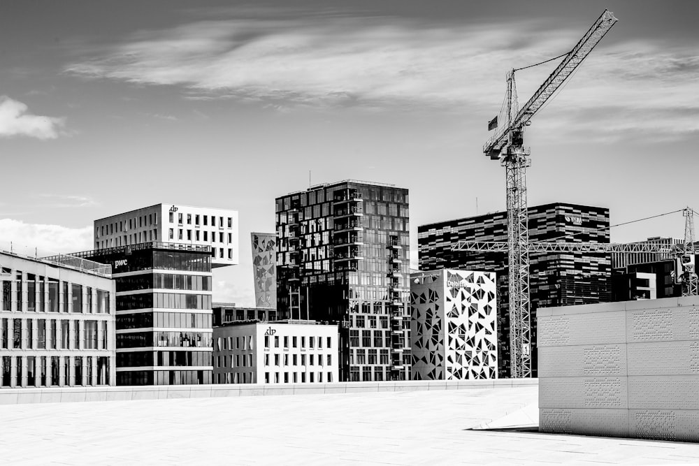 grayscale photography of concrete buildings