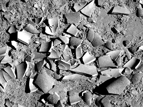 A detailed close-up of ancient pottery shards unearthed at an Ecuadorian archaeological site.