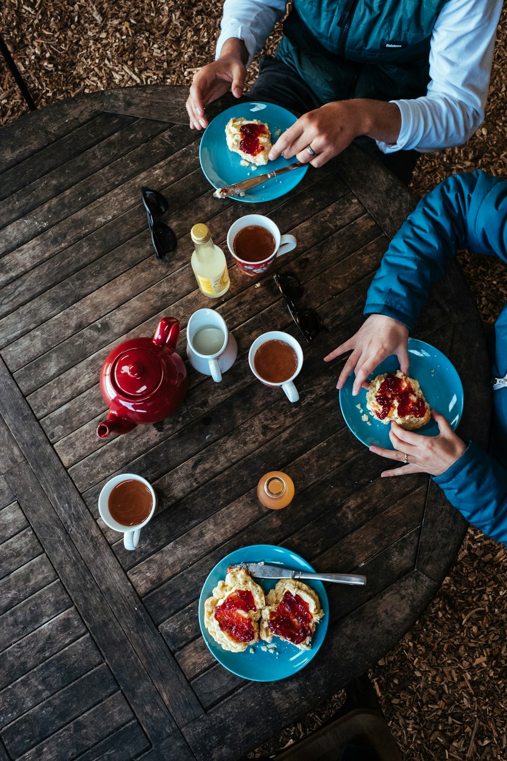 white ceramic cup and blue plates