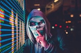 person standing near LED sign