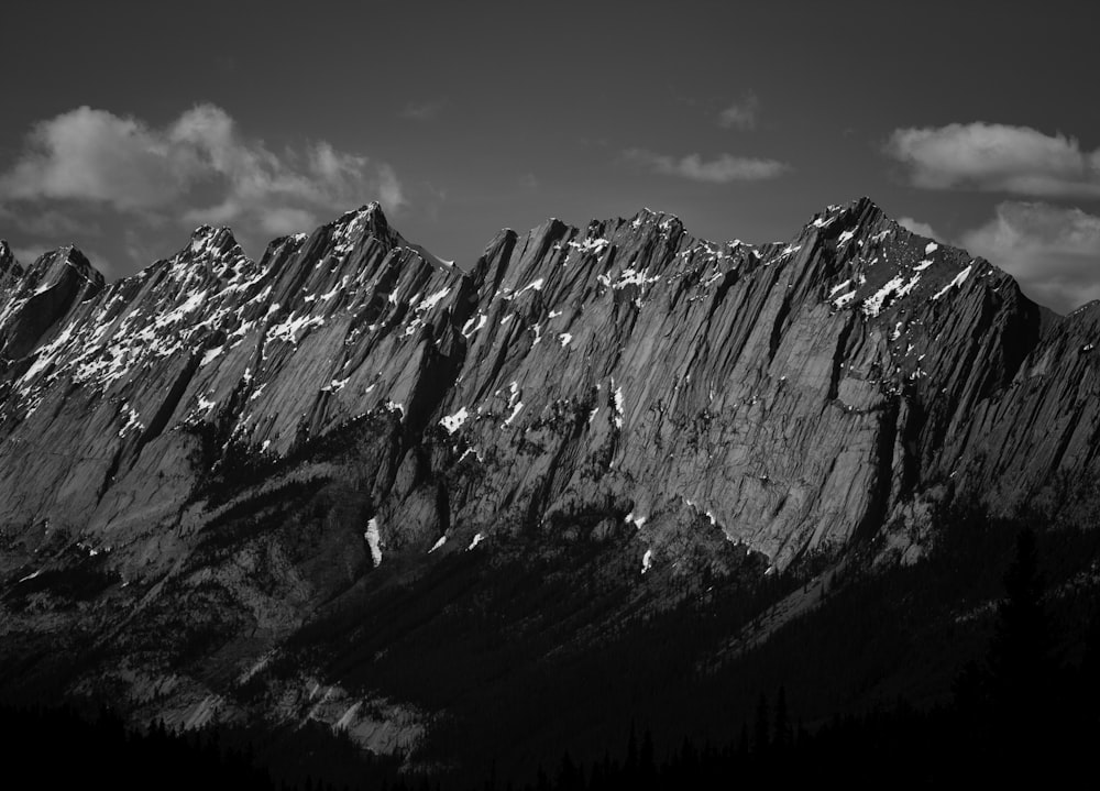 grayscale photo of rocky mountain