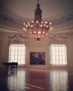 A cozy music room with a grand piano bathed in natural light, inviting students to play.