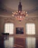 A warm, inviting music room with a grand piano bathed in soft natural light, reflecting the academy’s elegant atmosphere.