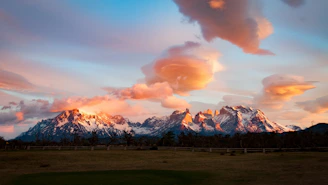 gray mountain under white clouds